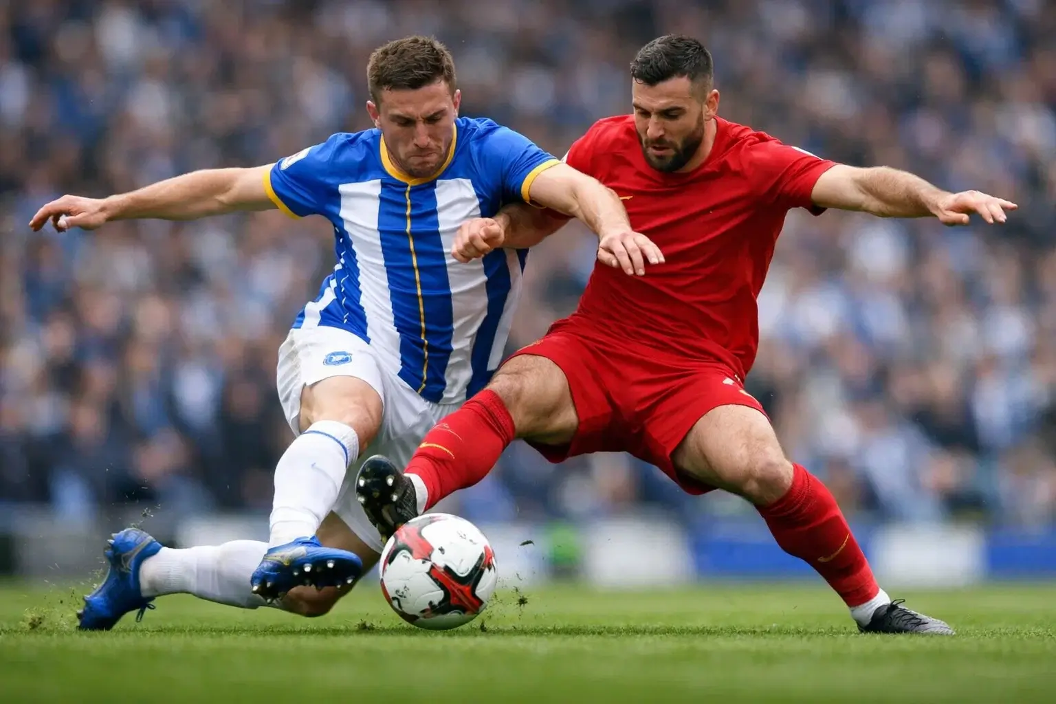 Midfielders from two teams competing for the ball in a tactical Premier League encounter