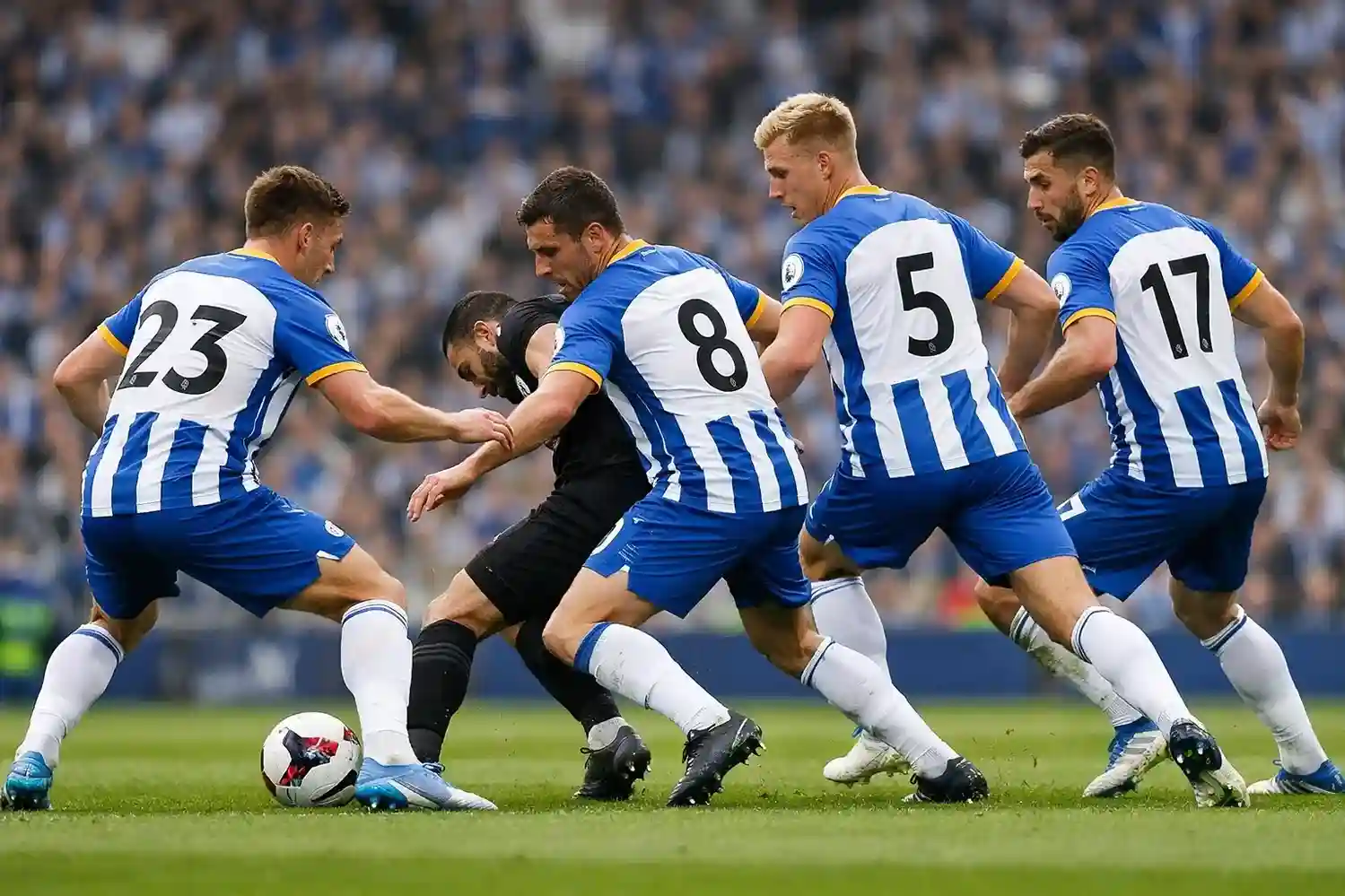 Brighton players pressing high up the pitch during a Premier League match